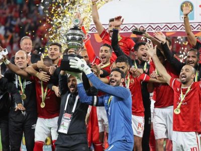Ahly s players celebrate after winning the CAF Super Cup against Raja