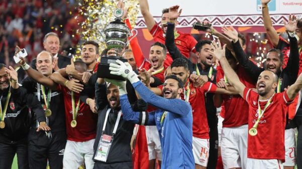 Ahly s players celebrate after winning the CAF Super Cup against Raja